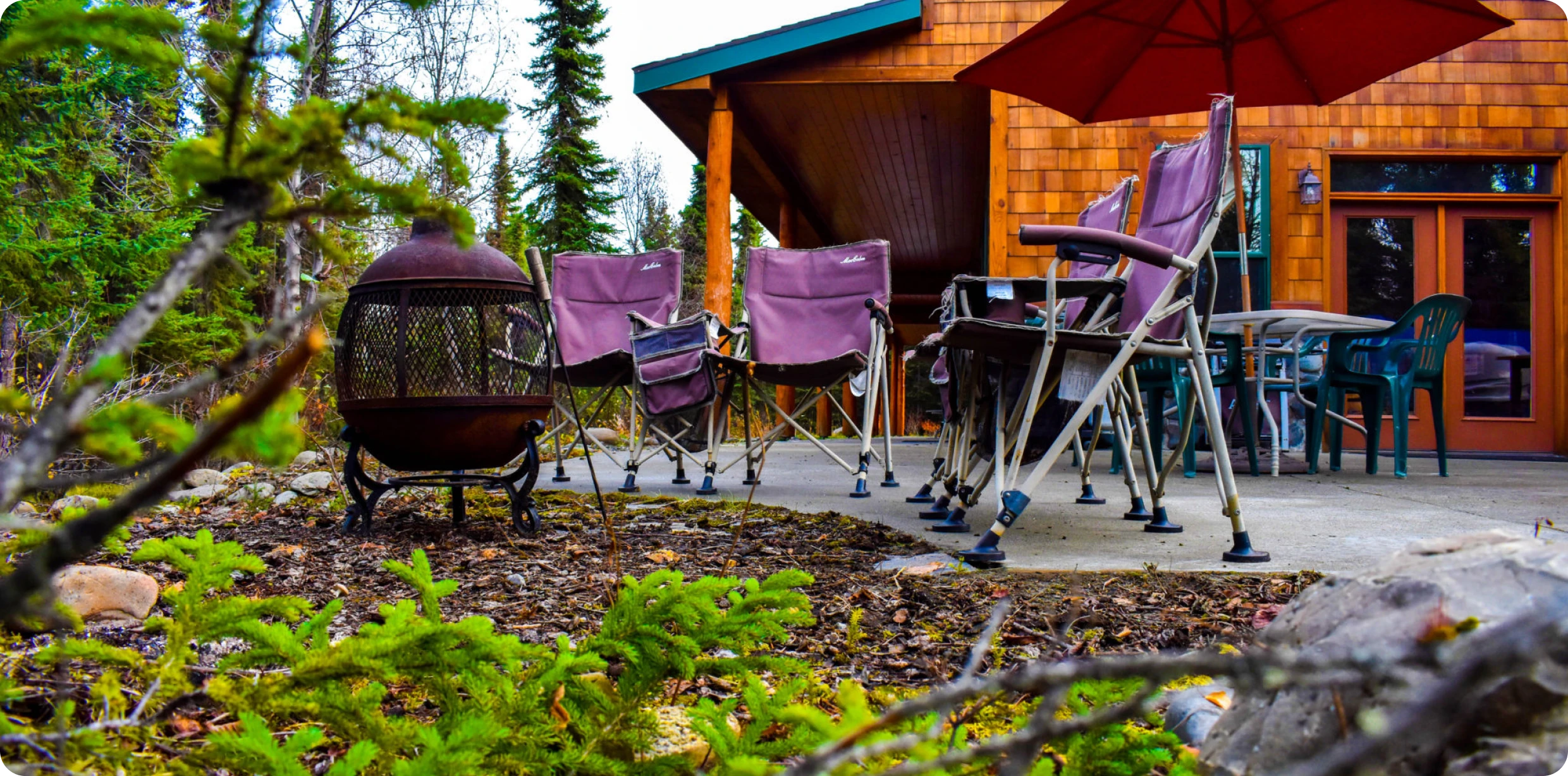 Forest cabin patio with outdoor seating